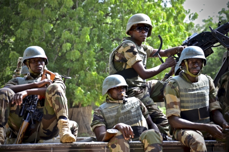 Niger soldiers provide security for an anti-Boko Haram summit in Diffa city, Niger September 3, 2015.