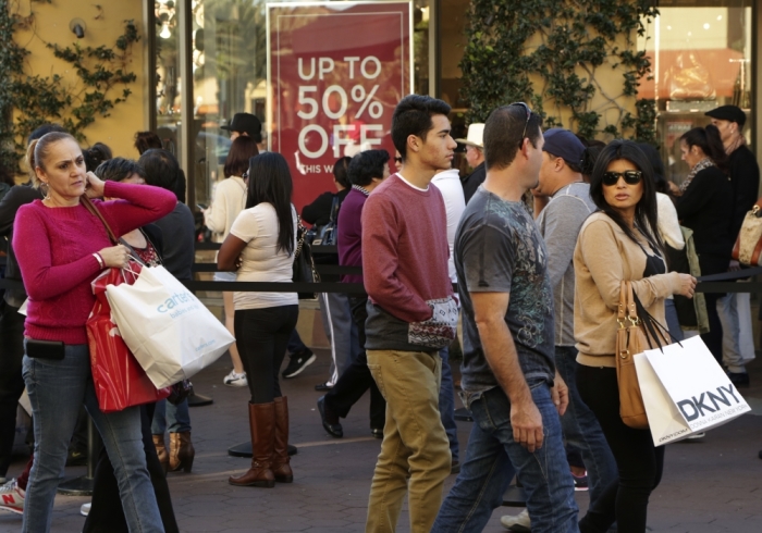 People shop during day after Christmas sales at Citadel Outlets in Los Angeles, California, December 26, 2014.