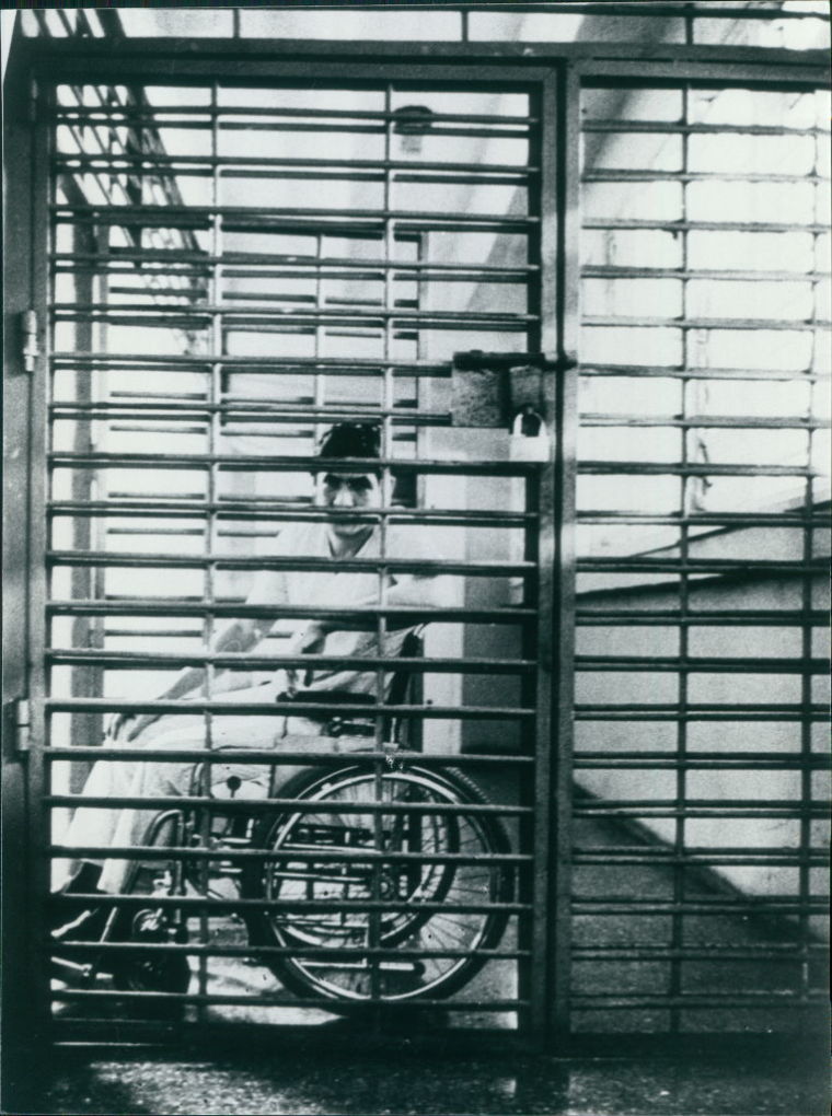 Armando Valladares bound to a wheelchair inside of a Cuban prison.