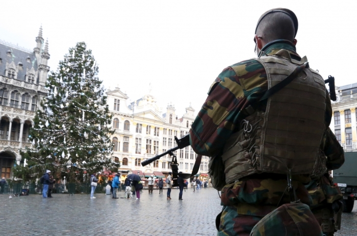 A Belgian soldier keeps guard on Brussels' Grand Place on November 22, 2015, after security was tightened in Belgium following the fatal attacks in Paris.