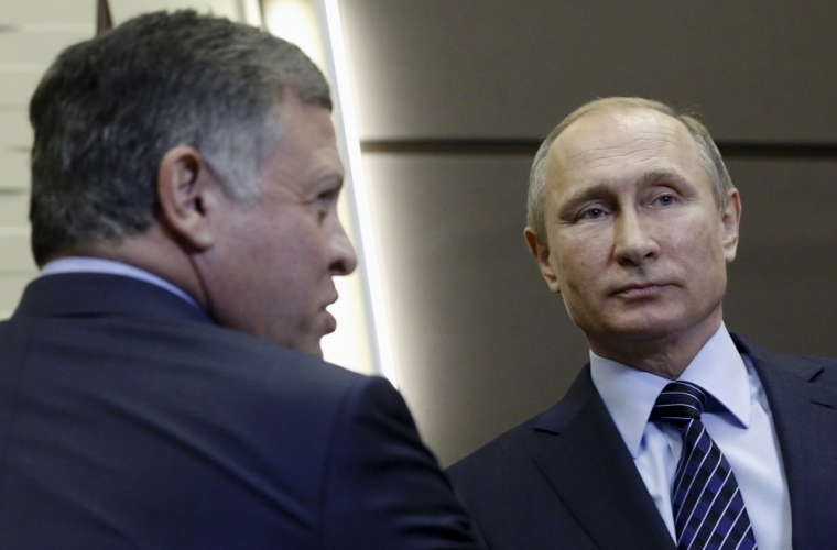 Russian President Vladimir Putin (R) and Jordan's King Abdullah attend a meeting at the Bocharov Ruchei state residence in Sochi, Russia November 24, 2015. Speaking before a meeting with Jordan's King Abdullah, Putin called Turkey's downing of a Russian fighter jet 'a stab in the back' carried out by the accomplices of terrorists, saying the incident would have serious consequences for Moscow's relations with Ankara.