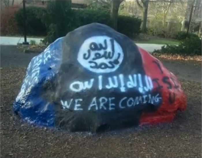 A popular rock at Youngstown State University in Ohio was vandalized with pro-Islamic State messages and a paintings of IS' black flag on November 23, 2015.