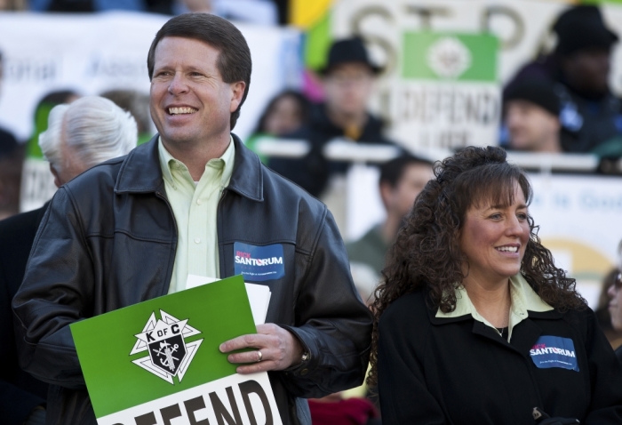 Jim Bob Duggar (L) and his wife Michelle Duggar (R), supporters of Republican presidential candidate and former Pennsylvania Senator Rick Santorum, attend a Pro-Life rally in Columbia, South Carolina, on the steps of the State House, January 14, 2012.