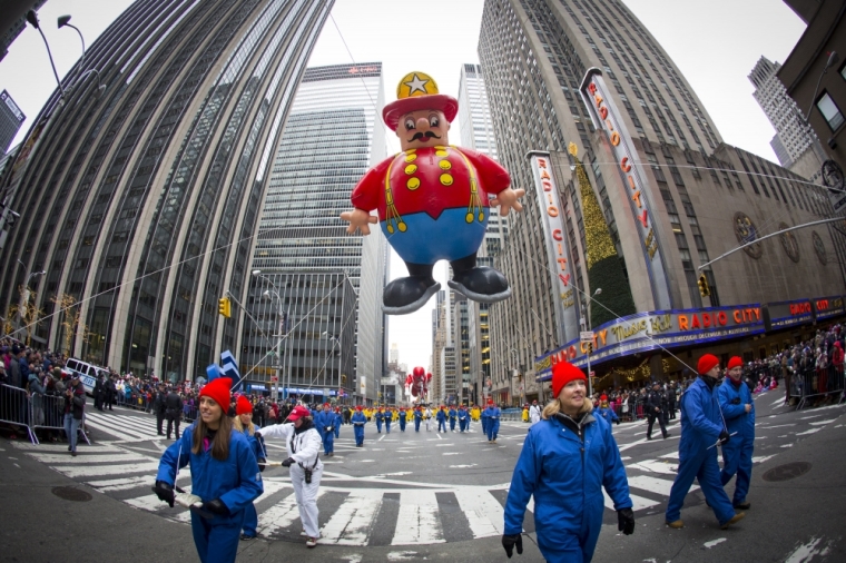 The Harold the Fireman balloon floats down Sixth Avenue during the 88th Annual Macy's Thanksgiving Day Parade in New York November 27, 2014.