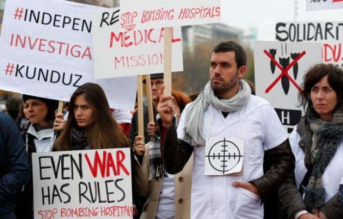 The staff of Medecins Sans Frontieres (MSF), also known as Doctors Without Borders, demonstrates in Geneva, Switzerland November 3, 2015, one month after the U.S. bombing of their charity-run hospital in Kunduz in Afghanistan