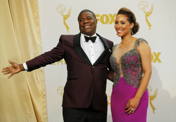 Actor Tracy Morgan and his wife, Megan Wollover, pose backstage during the 67th Primetime Emmy Awards in Los Angeles, California, September 20, 2015.
