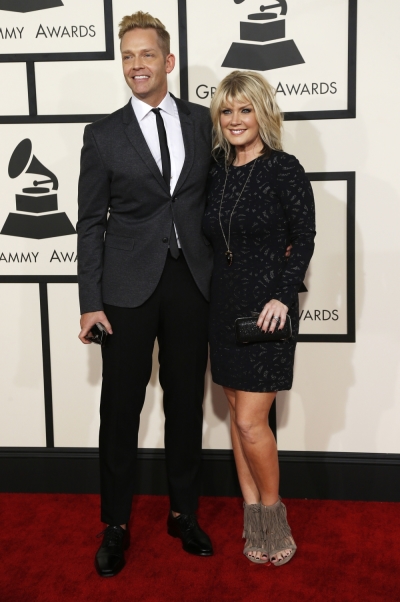 Bernie Herms and singer Natalie Grant arrive at the 57th annual Grammy Awards in Los Angeles, California, February 8, 2015.