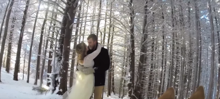 A dog with a GoPro camera attached to her back films the wedding of her owners.
