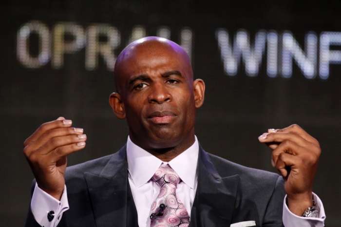 Deion Sanders talks about OWN: Oprah Winfrey Network's 'Deion's Family Playbook' during the Winter 2014 TCA presentations in Pasadena, California, January 9, 2014.