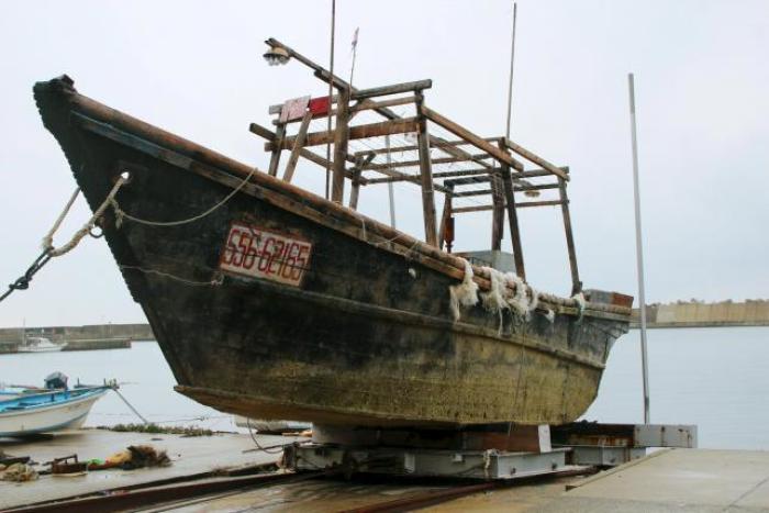 Unidentified wooden boat which was found in the sea off Noto Peninsula, is seen in Wajima, Japan, in this photo taken by Kyodo November 29, 2015.