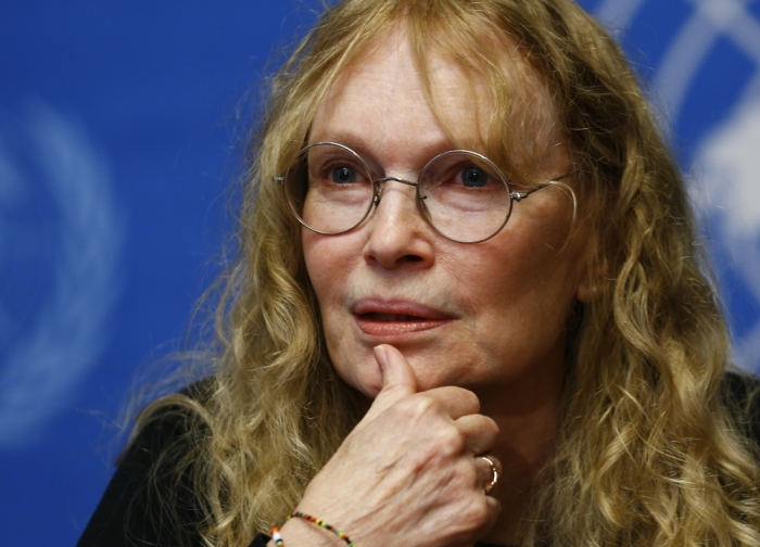 Actress and UNICEF Goodwill ambassador Mia Farrow pauses during a news conference at the United Nations European headquarters in Geneva, November 14, 2013.