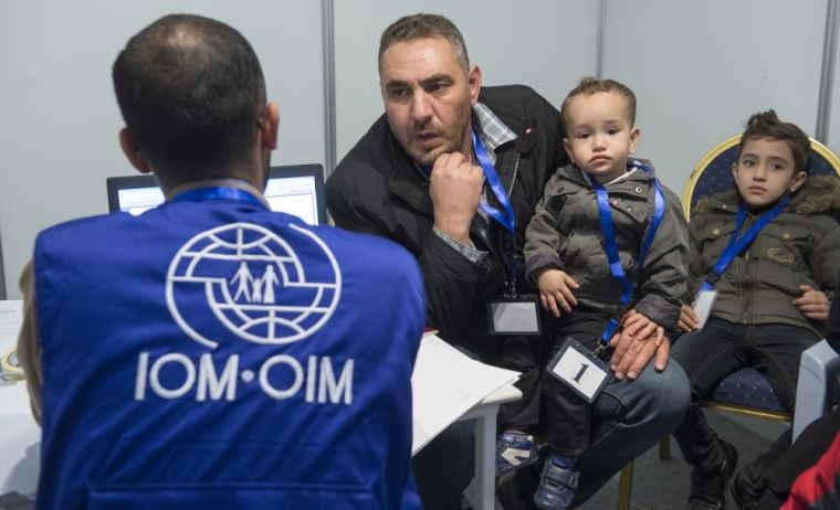A family of Syrian refugees are being interviewed by authorities in hope of being approved for passage to Canada at a refugee processing centre in Amman, Jordan, November 29, 2015.