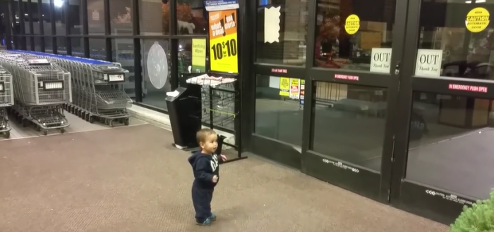 A toddler encounters automatic doors for the first time.
