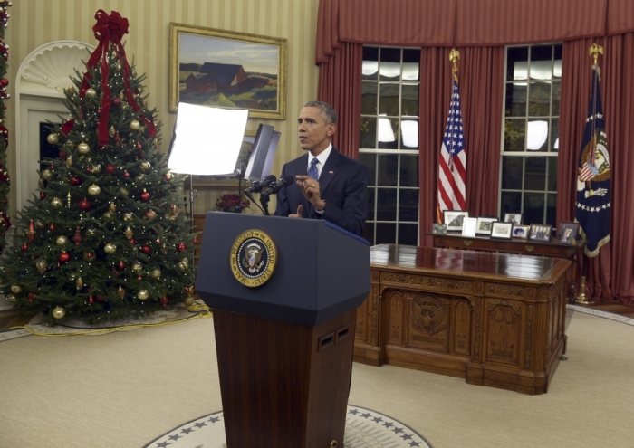 U.S. President Barack Obama speaks about counter-terrorism and the United States fight against Islamic State during an address to the nation from the Oval Office of the White House in Washington, December 6, 2015.