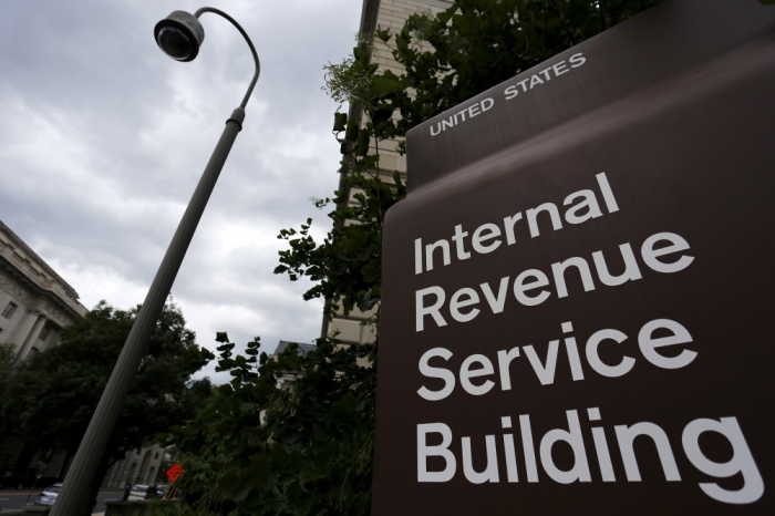 A security camera hangs near a corner of the U.S. Internal Revenue Service building in Washington, May 27, 2015. Tax return information for about 100,000 U.S. taxpayers was illegally accessed by cyber criminals over the past four months, U.S. IRS Commissioner John Koskinen said on Tuesday, the latest in a series of data thefts that have alarmed American consumers.