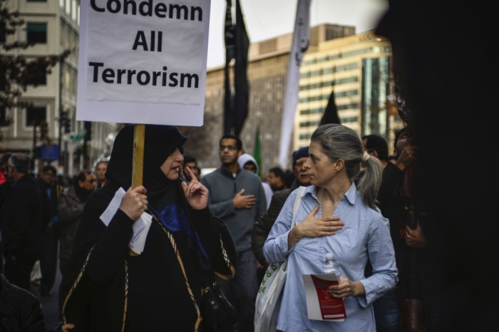 American Shiite Muslims march to the White House to protest against Islamic State, in Washington D.C. December 6, 2015.