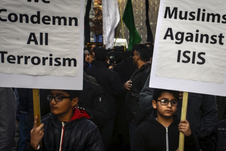 American Shiite Muslims march to the White House to protest against Islamic State, in Washington D.C. December 6, 2015.