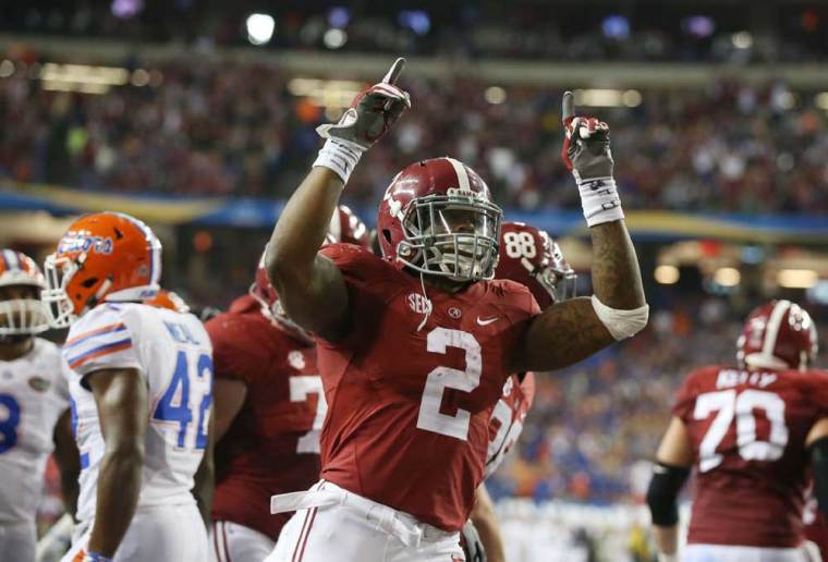 Alabama Crimson Tide running back Derrick Henry (2) celebrates his 2 yard touchdown run in the second quarter against the Florida Gators in the 2015 SEC Championship Game at the Georgia Dome.