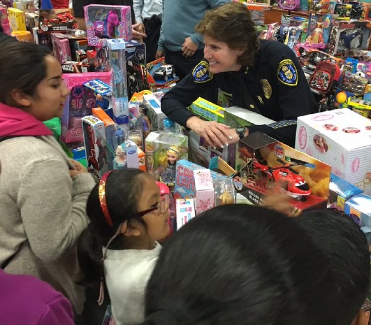Children peruse toys at Toys for Joy, an annual Christmas event hosted by The Rock Church, which benefits underserved San Diego-area families, San Diego, California, December 12, 2015.