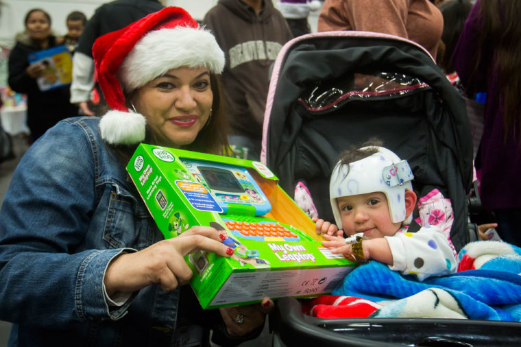 The 19th annual Toys for Joy event, organized by The Rock Church, gave away nearly 23,000 toys to underserved children in the San Diego area on Saturday, Dec. 12, 2015.