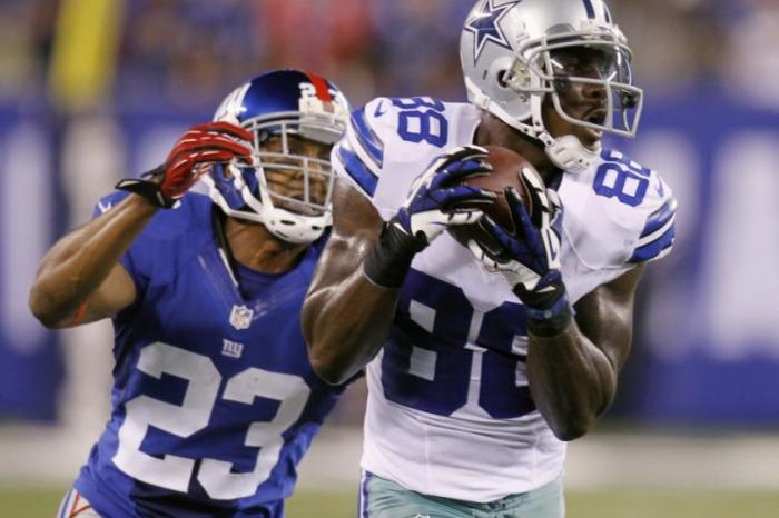 Dallas Cowboys wide receiver Dez Bryant (88) makes a 38 yard catch past New York Giants cornerback Corey Webster (23) in the first half during their NFL football game in East Rutherford, New Jersey, September 5, 2012.