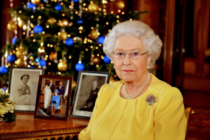 Britain's Queen Elizabeth poses for a photograph after recording her Christmas Day broadcast to the Commonwealth, in the Blue Drawing Room at Buckingham Palace, in central London, December 12, 2013.