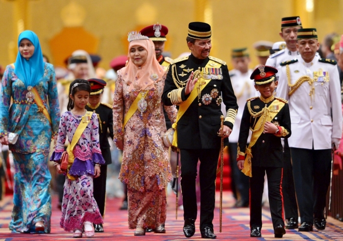 (Front row L-R) Brunei's Crown Princess Sarah, Princess Ameerah, Queen Saleha, Sultan Hassanal Bolkiah and Prince Abdul Wakeel leave the throne room during the Sultan's 69th birthday celebration in Nurul Iman palace in Bandar Seri Begawan, Brunei, August 15, 2015. Brunei's Sultan Hassanal Bolkiah was born on July 15, 1946. The official birthday celebrations were postponed due to the Sultan's birthday falling in the month of Ramadan, according to local media.