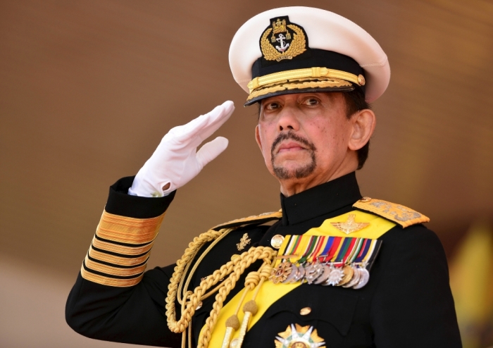 Brunei's Sultan Hassanal Bolkiah salutes during his 69th birthday celebrations in Bandar Seri Begawan, Brunei, August 15, 2015. Brunei's Sultan Hassanal Bolkiah was born on July 15, 1946. The official birthday celebrations were postponed due to the Sultan's birthday falling in the month of Ramadan, according to local media.