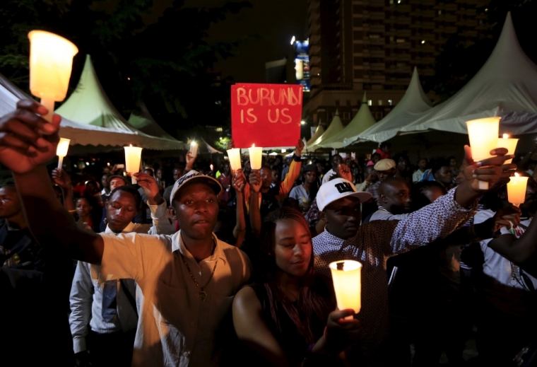 People light candles during a street concert organized to highlight the situation in Burundi by PAWA254, an activist organization, in Kenya's capital Nairobi, December 20, 2015.