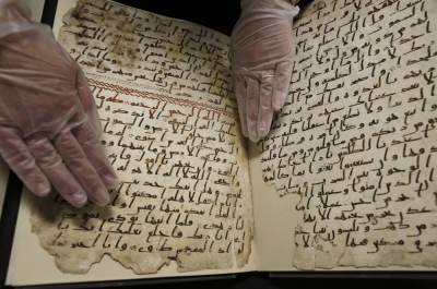 A fragment of a Quran manuscript is seen in the library at the University of Birmingham in Britain July 22, 2015. A British university said on Wednesday that fragments of a Koran manuscript found in its library were from one of the oldest surviving copies of the Islamic text in the world, possibly written by someone who might have known the Islamic prophet Mohammad. Radiocarbon dating indicated that the parchment folios held by the University of Birmingham in central England were at least 1,370 years old, which would make them one of the earliest written forms of the Islamic holy book in existence.