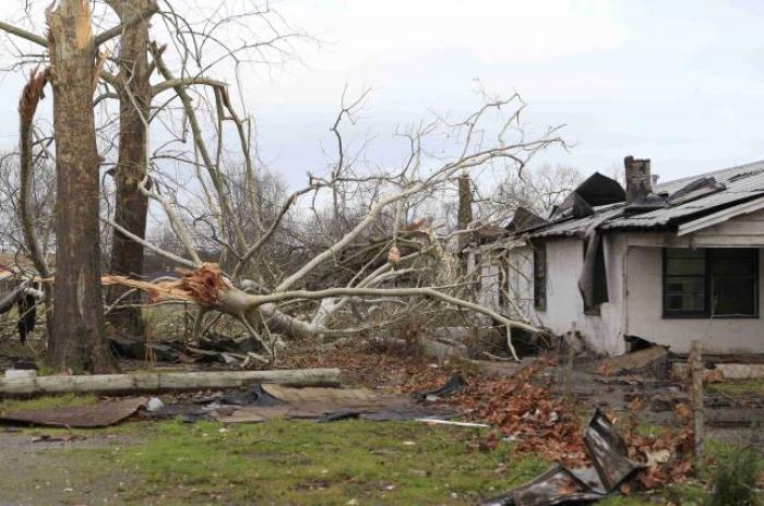 Damage caused by a tornado is seen in a neighborhood in Birmingham, Alabama, December 26, 2015.