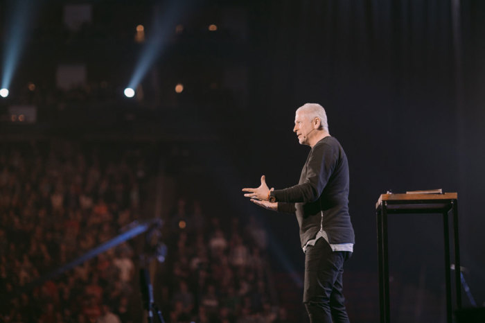 Louie Giglio, founder of the Passion Movement and pastor of Passion City Church in Atlanta, speaks to tens of thousands of young adults in Houston's Toyota Center on Saturday, January 2, 2016. Students in Atlanta were able to watch Giglio through livestream for the first time in Passion's 19 year history.