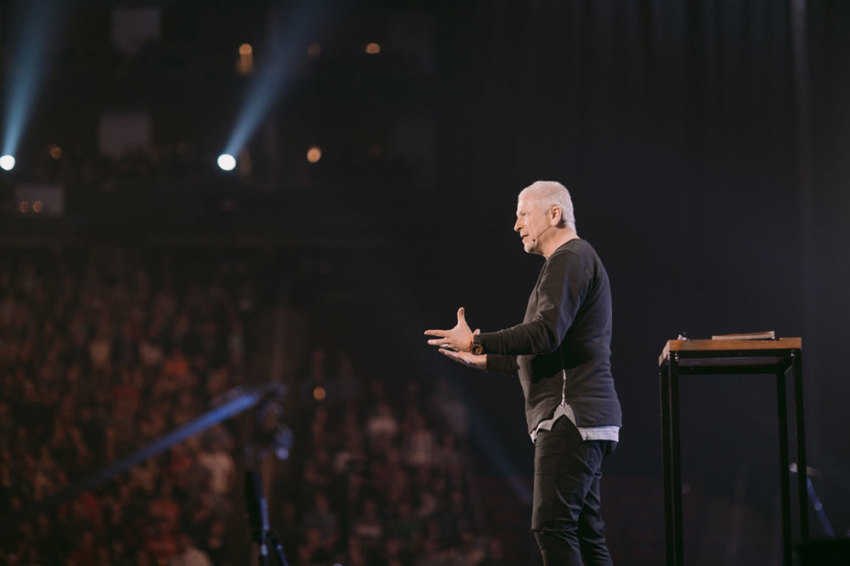 Louie Giglio, founder of the Passion Movement and pastor of Passion City Church in Atlanta, speaks to tens of thousands of young adults in Houston's Toyota Center on Saturday, January 2, 2016. Students in Atlanta were able to watch Giglio through livestream for the first time in Passion's 19 year history.