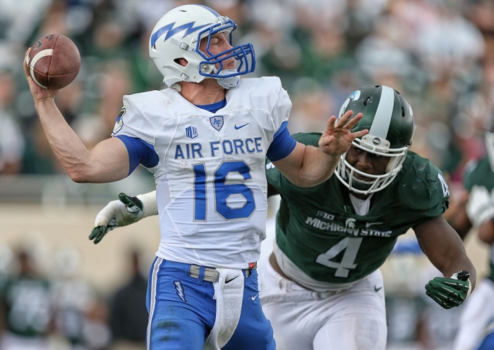 Air Force Falcons quarterback Karson Roberts (16) throws the ball against the Michigan State Spartans at Spartan Stadium, East Lansing, Michigan, September 19, 2015.