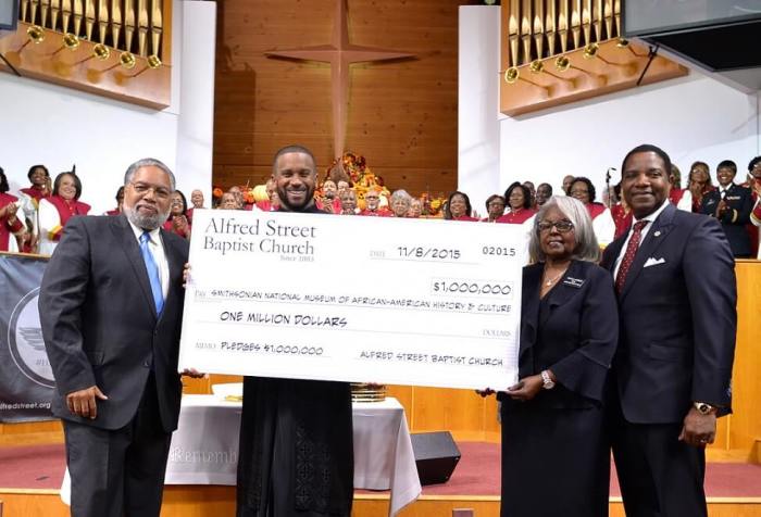Historic African-American congregation Alfred Street Baptist Church in Alexandria, Virginia, announces plan to donate 640 million to the Smithsonian's National Museum of African-American History and Culture. From Left: Lonnie G. Bunch III, founding director of the Smithsonian National Museum of African-American History and Culture; the Rev. Howard-John Wesley, pastor of Alfred Street Baptist Church; Patricia Johnson, chair of the ASBC Deacon Board; and James McNeil, chair of the ASBC Board of Trustees.