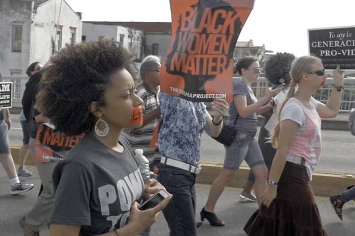 Christina Marie Bennett marches in silent prayer against abortion in Selma, Alabama