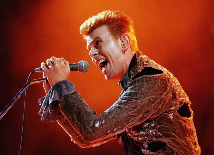 Famous British rock singer David Bowie performs at the Panathinaikos stadium in Athens during a rock festival, July 1. The two-day festival includes performances by Lou-Reed, Simply-Red, and Elvis-Costello.