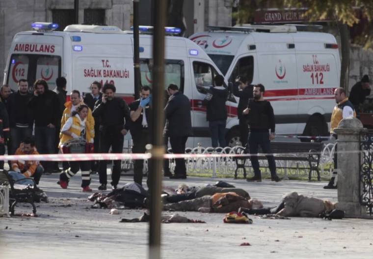 Rescue teams gather at the scene after an explosion at Sultanahmet square in Istanbul, Turkey, January 12, 2016. The suicide bomber who killed at least 10 foreigners in the heart of Istanbul's historic tourist district on Tuesday, most of them German, was a foreign member of Islamic State, Turkish Prime Minister Ahmet Davutoglu said.