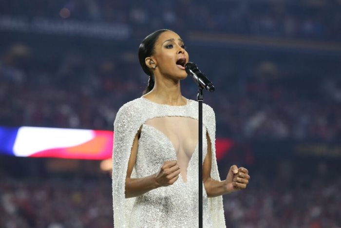 Recording artist Ciara Harris sign the National Anthem prior to the game between the Alabama Crimson Tide and the Clemson Tigers in the 2016 CFP National Championship at University of Phoenix Stadium in Glendale, Arizona, January 11, 2016.