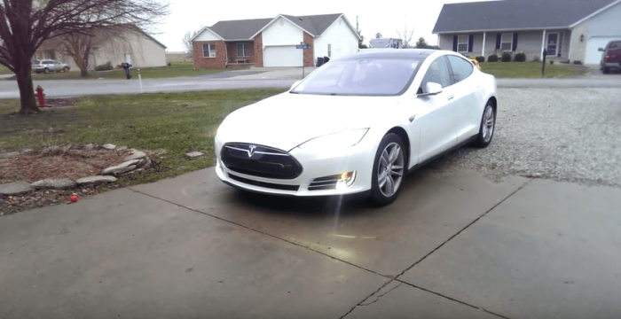 A Tesla Model vehicle whose 'Summon' feature let's it park itself.