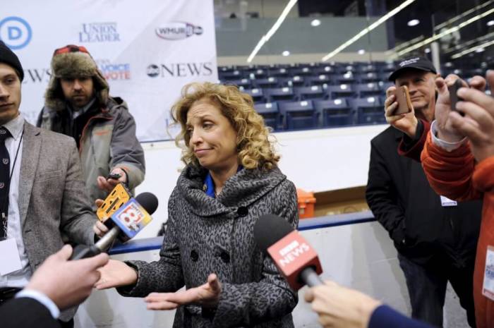 Democratic National Committee chair Debbie Wasserman Schultz talks with members of the media before the Democratic presidential candidates debate at Saint Anselm College in Manchester, New Hampshire, December 19, 2015.