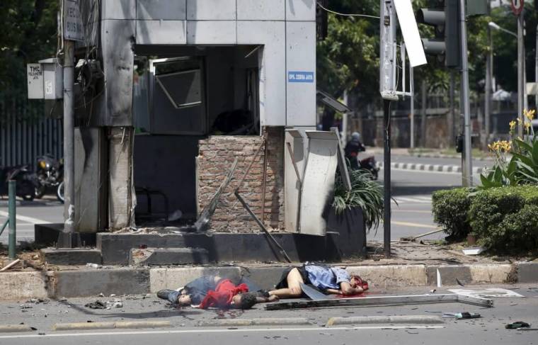 The bodies of victims lie at the site of a blast in Jakarta, Indonesia, January 14, 2016. Several explosions went off and gunfire broke out in the center of the Indonesian capital on Thursday and police said they suspected a suicide bomber was responsible for at least one the blasts.