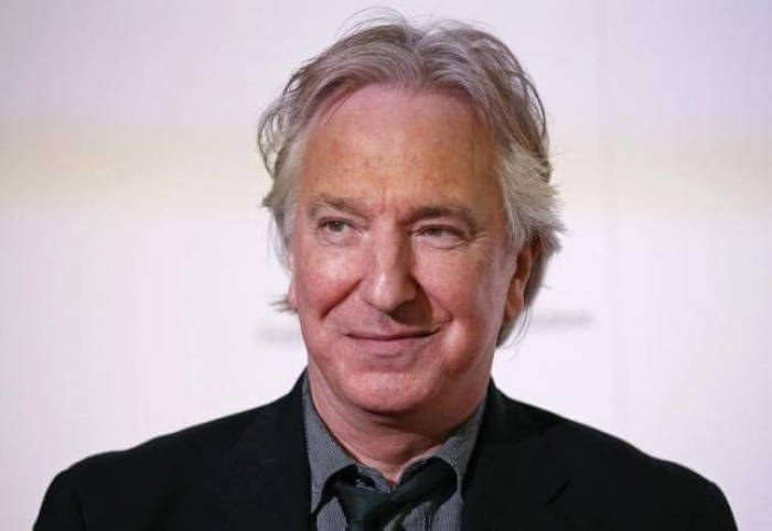 Actor Alan Rickman poses for a photo before a special family fundraising evening hosted by author J.K. Rowling in aid of her children's charity, Lumos, at the Warner Bros. Studio The Making of Harry Potter in Hertfordfshire, London, November 9, 2013.