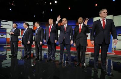 Republican U.S. presidential candidates (L-R) Governor John Kasich, Governor Chris Christie, Senator Marco Rubio, businessman Donald Trump, Senator Ted Cruz, Dr. Ben Carson and former Governor Jeb Bush pose together before the start of the Fox Business Network Republican presidential candidates debate in North Charleston, South Carolina January 14, 2016.