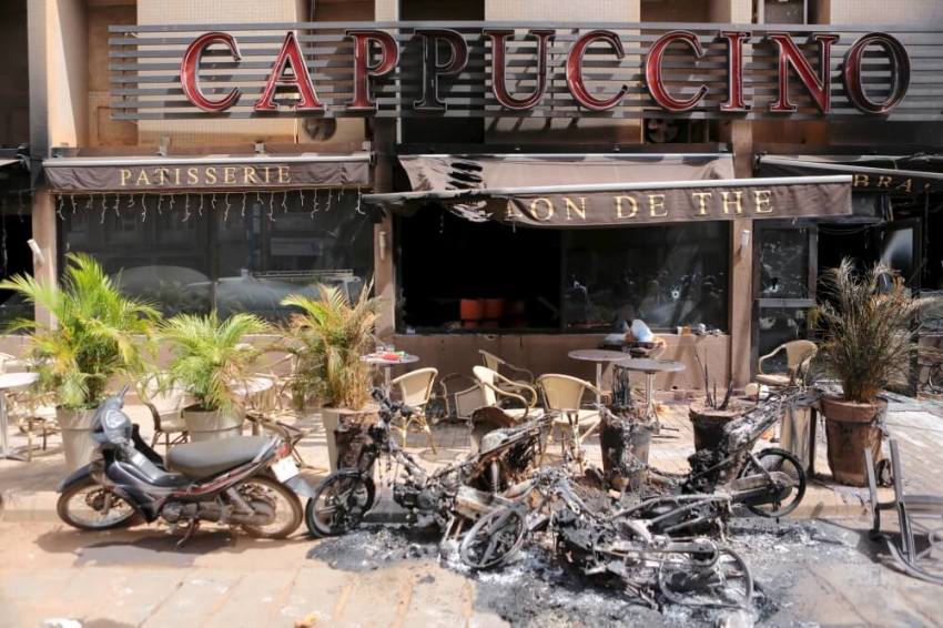 The burned-out exterior of "Cappuccino" restaurant is seen in Ouagadougou, Burkina Faso, January 17, 2016.