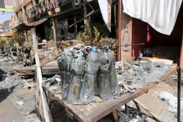 Bottles of water are seen in front of Cappuccino restaurant after an attack on the restaurant and the Splendid Hotel in Ouagadougou, Burkina Faso, January 18, 2016.