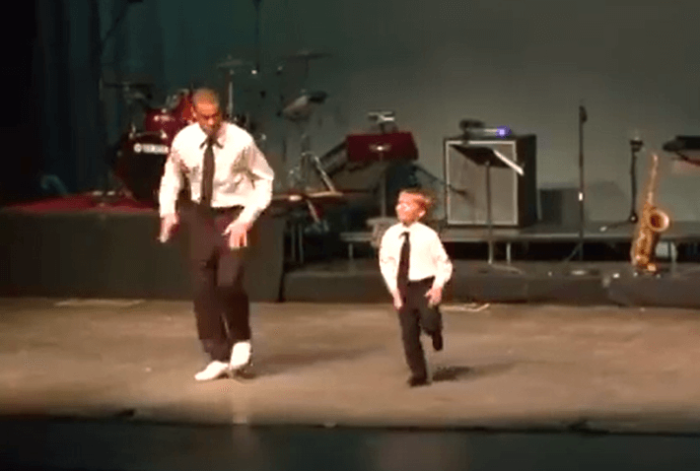 Boy shows off tap dancing talents.