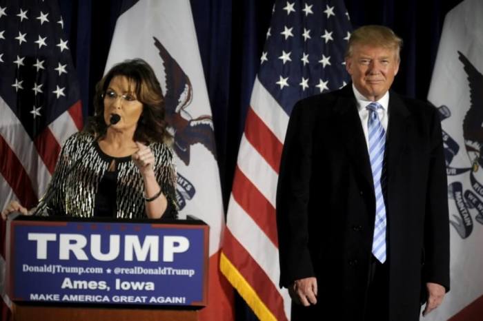 U.S. Republican presidential candidate Donald Trump (R) as former Alaska Gov. Sarah Palin endorses him at a rally at Iowa State University in Ames, Iowa, Jan. 19, 2016.