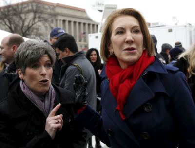 Republican presidential candidate Carly Fiorina (R) and Senator Joni Ernst (R-IA) (L) chat backstage at the National March for Life rally in Washington January 22, 2016. The rally marks the 43rd anniversary of the U.S. Supreme Court's 1973 abortion ruling in Roe v. Wade.