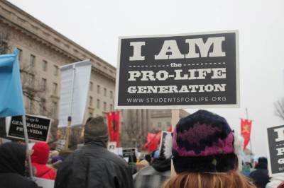 A march participant holds up a pro-life sign at the March for Life in Washington, D.C. on January 22, 2016.